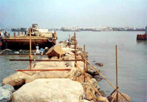  Placing of armor rock bulkhead at reclamation Area A